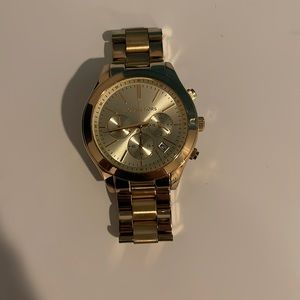 Michael Kors women’s gold watch